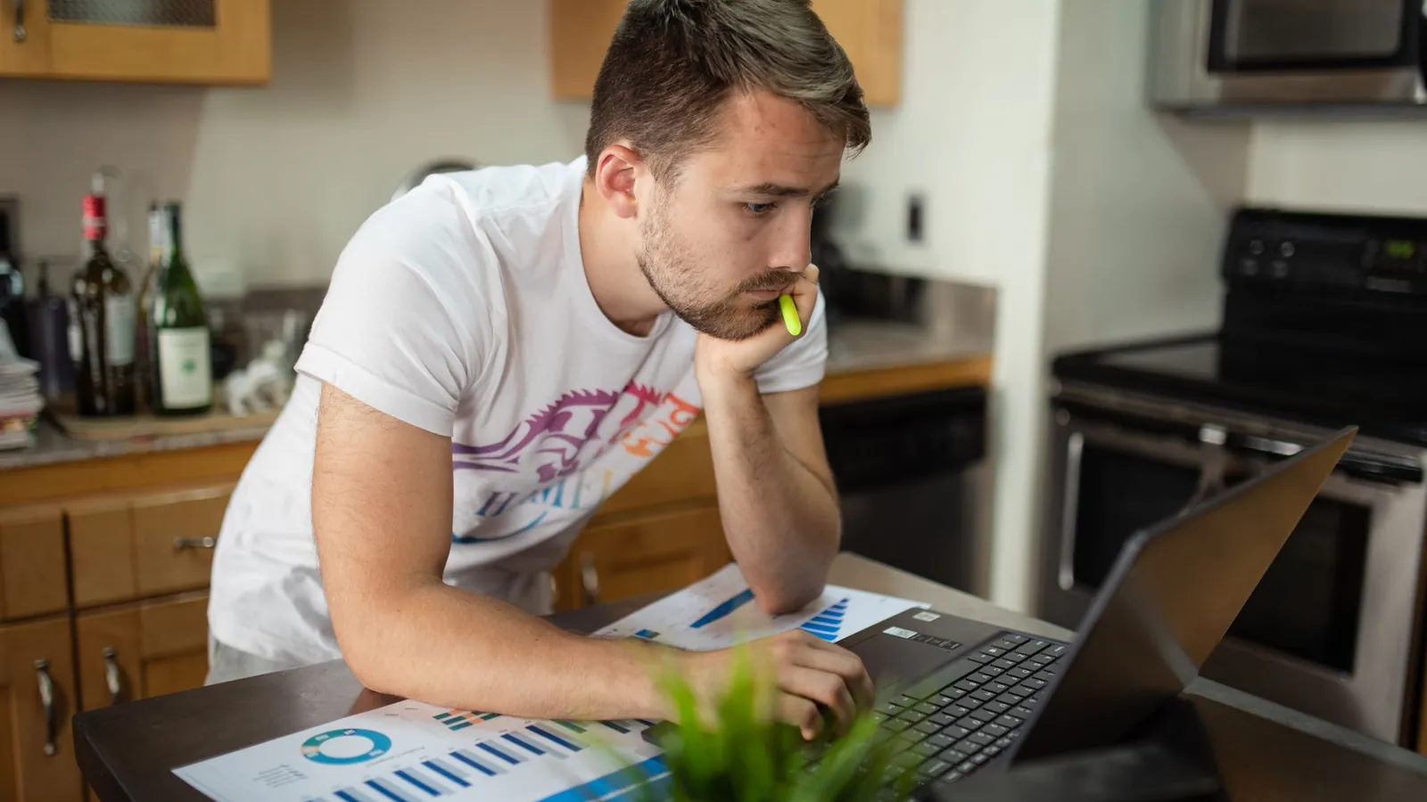 Man analyzing charts on a laptop after a Google core update traffic drop