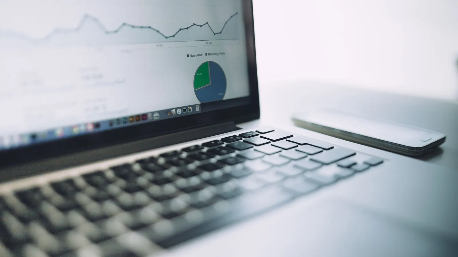 Laptop showing an analytics dashboard for the free SEO audit article