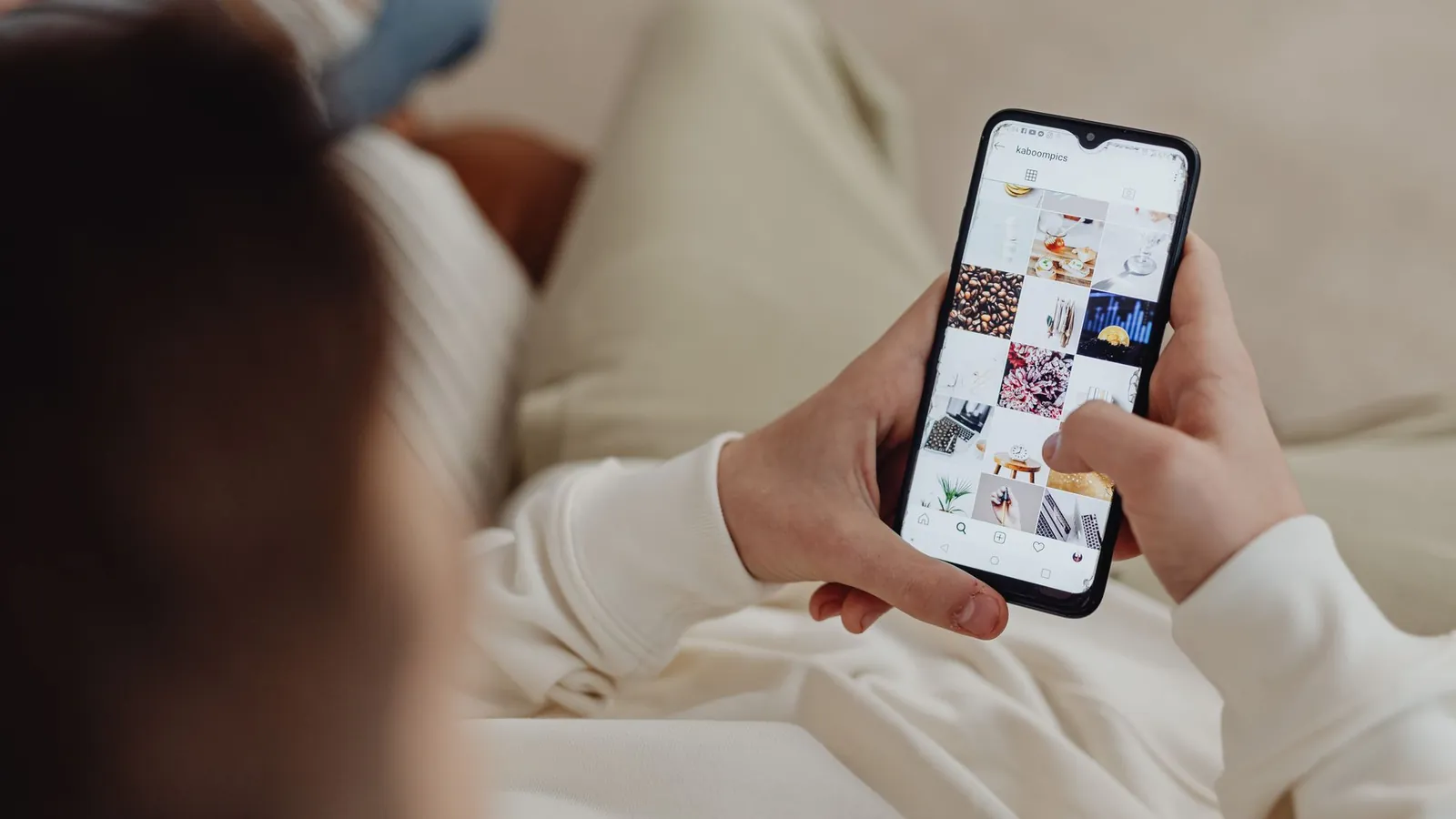 Person browsing social media on a smartphone, a core digital marketing channel